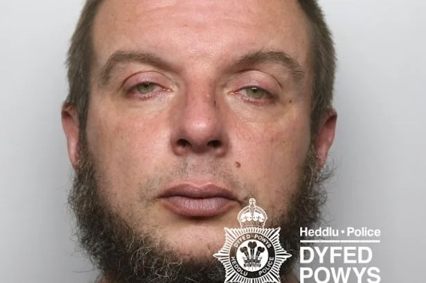 Man accused of attacking intruder with objects