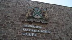 Man charged with woman's death appears in court